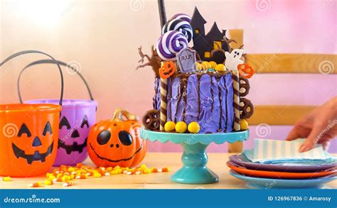 On Trend Halloween Candyland Novelty Drip Cake In Colourful Party