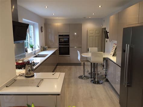 This Galley Kitchen Incorporates A Breakfast Bar Area To Create A