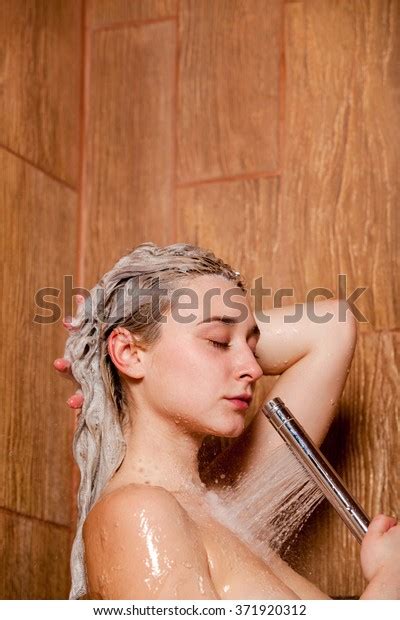 Beautiful Woman Standing Shower She Holds Stock Photo Shutterstock