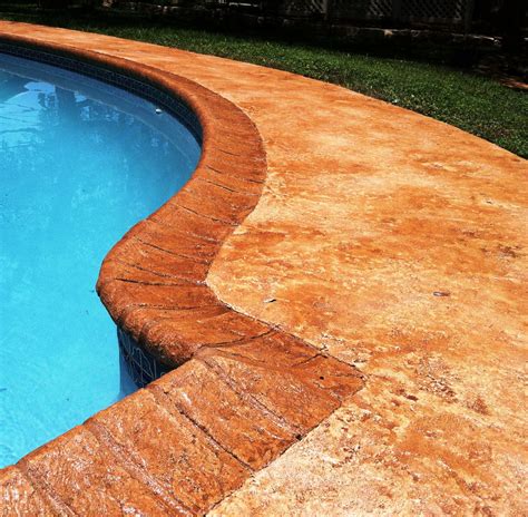 Sundek Sunstamp Decorative Concrete Overlay System For A Pool Deck And Coping Stones Sundek