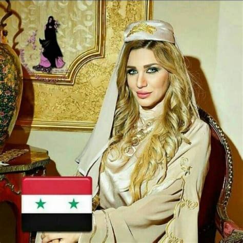 ملكة جمال سوريا تثير الجدل بـ تاتو غريب على رقبتها دنيا الوطن