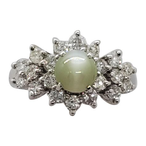 cat s eye green chrysoberyl cabochon and white diamond ring in platinum for sale free shipping