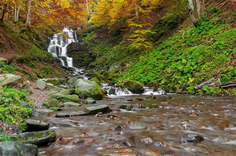 Mountain Waterfall In Autumn Forest Background Stock Photos