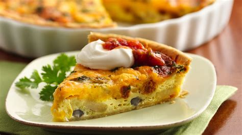 Hearty vegetables, a gooey sauce, and a flaky, sage crust. Southwest Breakfast Pie recipe from Pillsbury.com