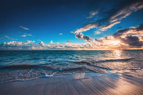 Beautiful Cloudscape Over The Sea Sunrise Shot Stock Photo