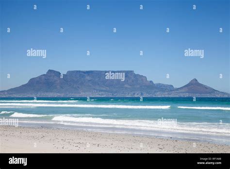 View Of Table Mountain Over Table Bay From Bloubergstrand Cape Town