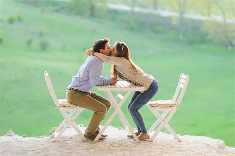 Woman Kissing Her Man Stock Image Image Of Embracing 57169053