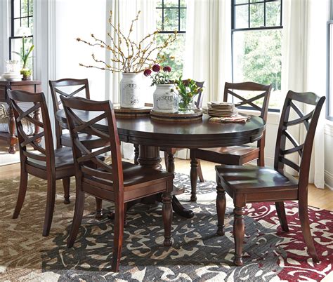 Shop ashley furniture homestore online for great prices, stylish furnishings and home decor. Ashley Furniture Porter 7-Piece Round Dining Table Set ...