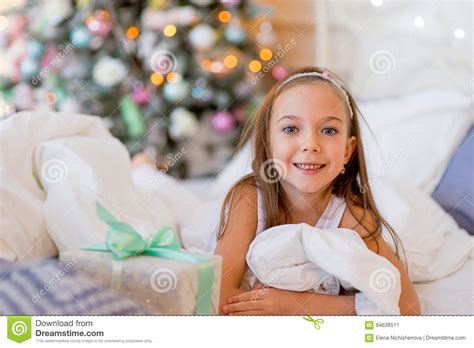Child Girl Wake Up In Her Bed In Christmas Morning Stock Image Image
