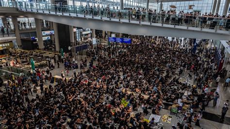 Hong Kong Protesters Descend On Airport With Plans To Stay For Days