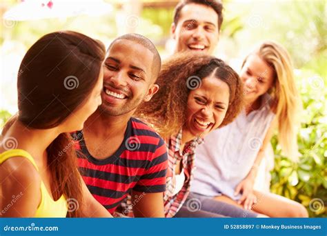 Group Of Friends Relaxing Outdoors On Holiday Together Stock Image Image Of Vacation Outdoors