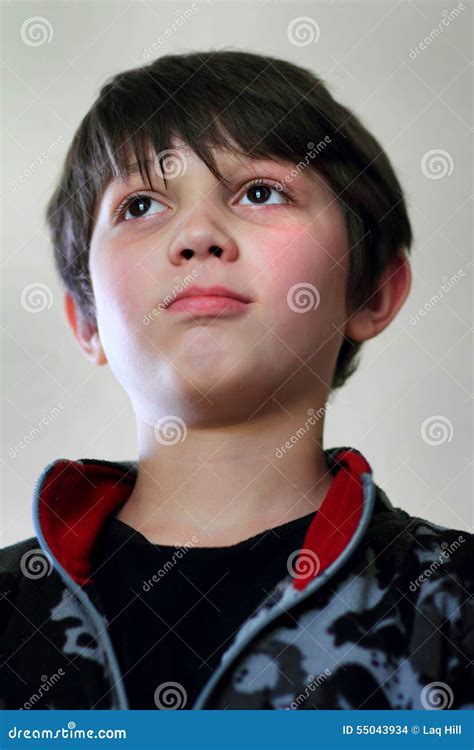 Determined Young Dark Haired Boy Stock Photo Image Of Dark Attitude