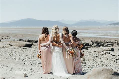 loving these pink bridesmaid gowns featured at this beachy canadian wedding image by nomad by