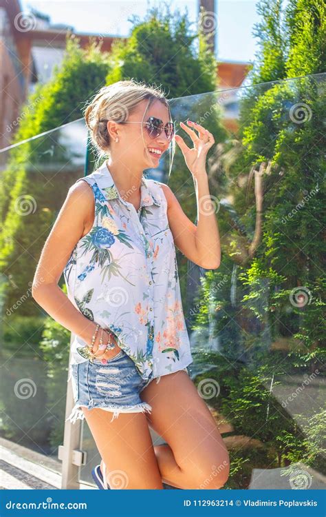 Slim Blond Woman In Jeans Shorts Posing Stock Photo Image Of Face