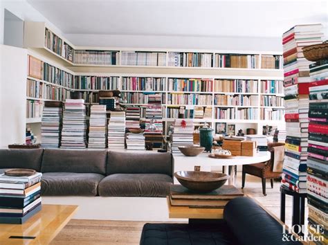 You can simply use bookcases, wrap your tv in shelves with books, put books into a room divider if it has shelves or into a console table behind your sofa. 8 Ways Coffee-Table Books Can Be Used As Decor | Architectural Digest