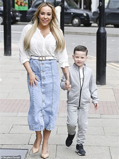 Stephanie Davis Looks Every Inch The Doting Mother As She Holds Hands