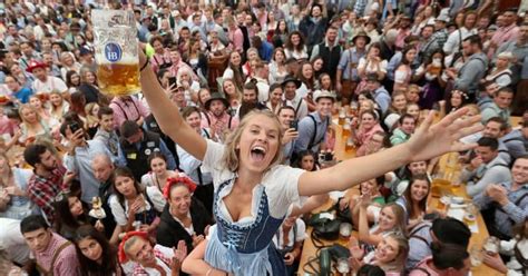 traditionalists slam over sexualized oktoberfest porno dresses as tourists let it all hang out