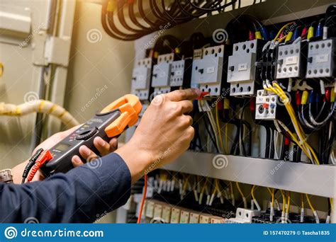 Electrician Engineer Work Tester Measuring Voltage And Current Of Power