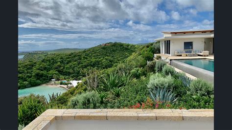 This hilltop resort is surrounded by forest just off e59. LaGuardia Design Group | Antigua Residence