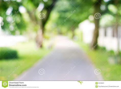Blurred Park With Side Walk On Green Nature Background Stock Image