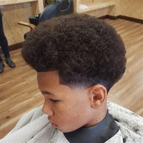 The best black boys haircuts combine a cool style with functionality. 35 Popular Haircuts For Black Boys: 2021 Trends