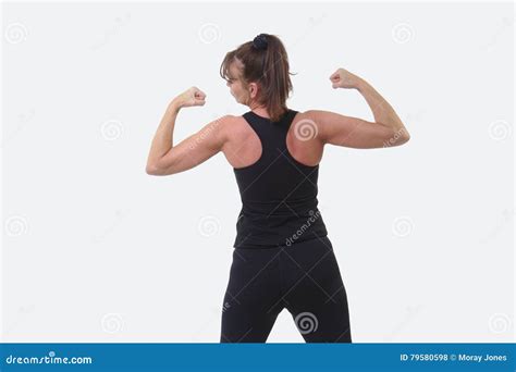 Attractive Middle Aged Woman In Sports Gear With Her Back To The Camera
