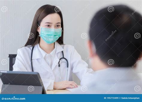 Asian Female Doctor Asking Patient Questions Stock Image Image Of