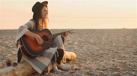 Beautiful Young Woman Playing Guitar On Beach Stock Video Footage