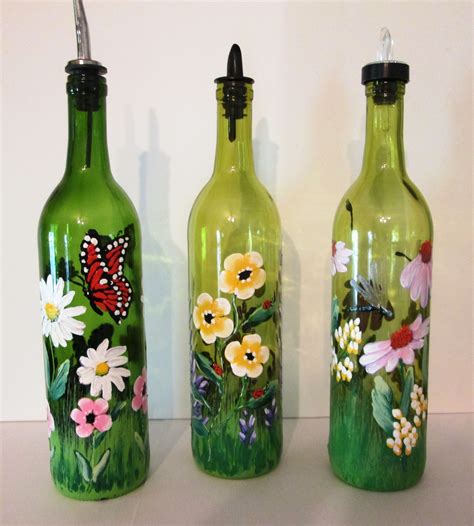 Vibrant Painted Wine Bottles With Butterflies Lady Bugs And