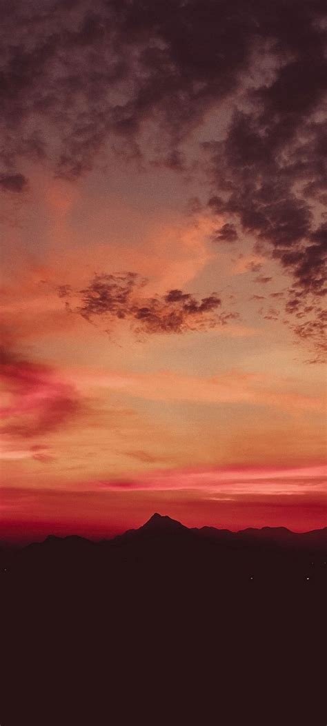 Sunset Mountains Clouds Sky Wallpaper 720x1600