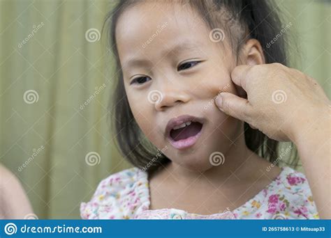 Asian Mother And Child Girl Playing Pinch Cheeks Touch Nose Funny Face