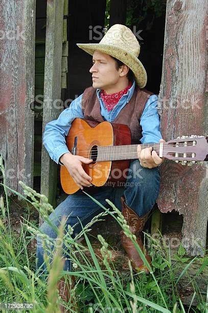Cowboy Guitarist Stock Photo Download Image Now 20 24 Years 25 29