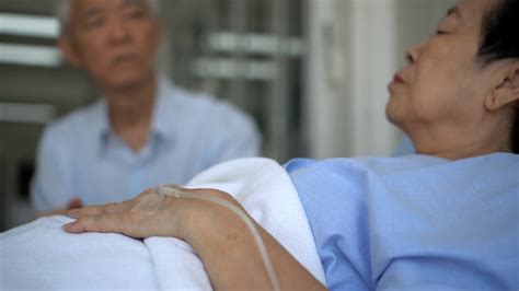 Asian Senior Couple Husband Taking Care Wife Who Sick Cough In Hospital