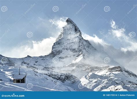 Great View Of Matterhorn East Face Covering By Clouds Stock Photo