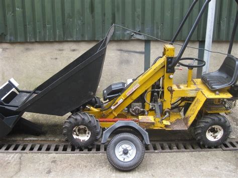 Roughneck High Lift Dumper With Trailer Tow Kit And Loader Bucket In