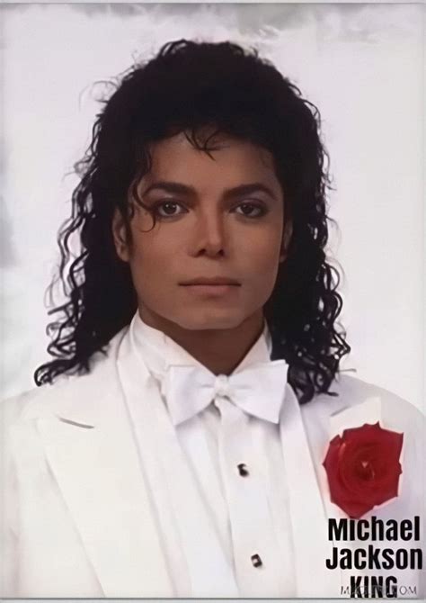 Michael Jackson Wearing A White Suit And Red Rose