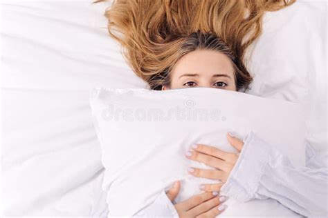 A Young Girl Is Too Lazy To Get Out Of Bed Woman Covers Her Face With
