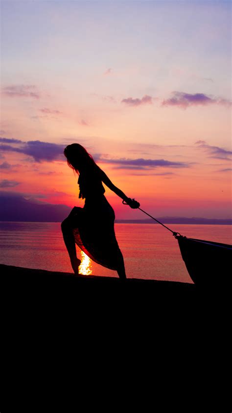 1440x2560 Women Towing Boat Beach Sunset Silhouette Samsung Galaxy S6
