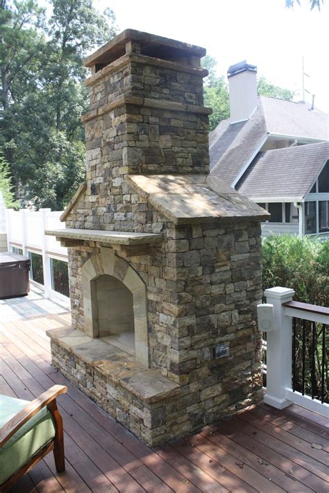 Outdoor Stacked Stone Fireplace With Hearth Fireplaces And Firepits