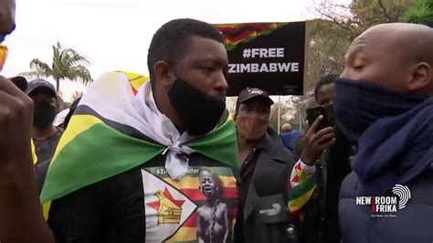 Protesters And Police Clash Outside The Zimbabwean Embassy In Pretoria Youtube