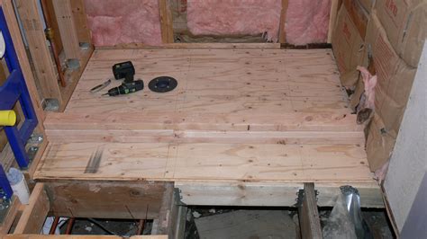Dry out a wet bathroom subfloor to prevent rotting. How to Build a Shower