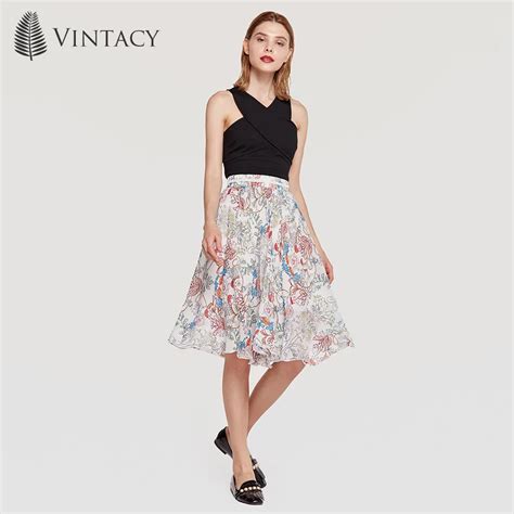 Vintacy Women Elegant Skirt Pleated Summer Floral Print Boho A Line Vintage Beach Sexy Knee