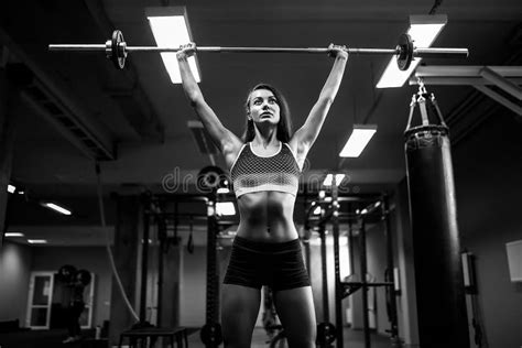 Woman Lifting Barbell With Weight In Gym Stock Image Image Of Clothing Club 41205501