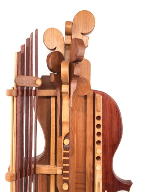 Lot - Abstract Carved Wood Musical Instrument Wall Art