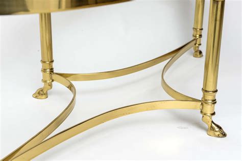 Save to favoritesduet oval coffee table. Oval Brass Coffee Table with Mirrored Rim Glass Top at 1stdibs