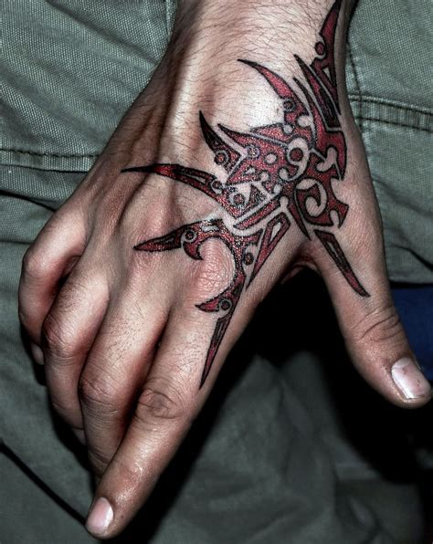 Eye tattoo on hand with some cool hand tattoo designs looks very cool. tattoos for men on hand - Google Search | Tribal hand ...