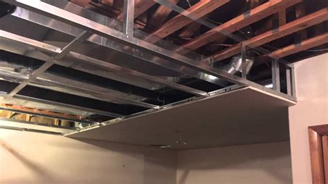 Some people think suspended ceilings look cold and institutional; DRYWALL SUSPENSION GRID FRAME - YouTube