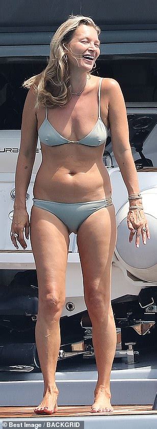 Kate Moss 45 Shows Off Model Figure In A Skimpy Grey Bikini