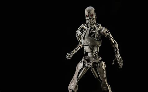 This 6ft tall animatronic robot is loosely based on the terminator. terminator robots skeleton skull black background HD wallpaper
