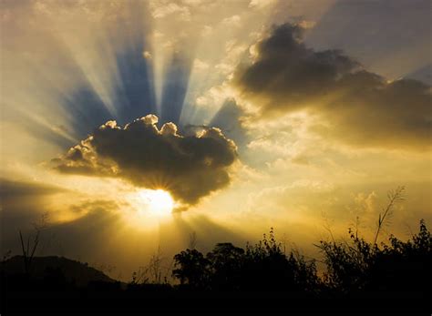 Sun Breaking Through Clouds Pictures Images And Stock Photos Istock